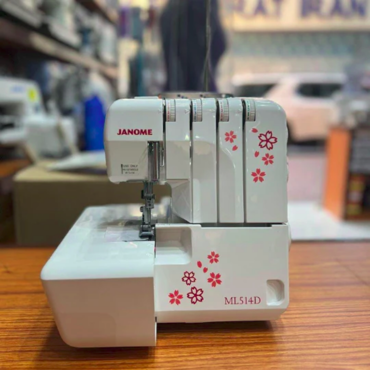 Janome ML514D - Overlock machine - White - Front view