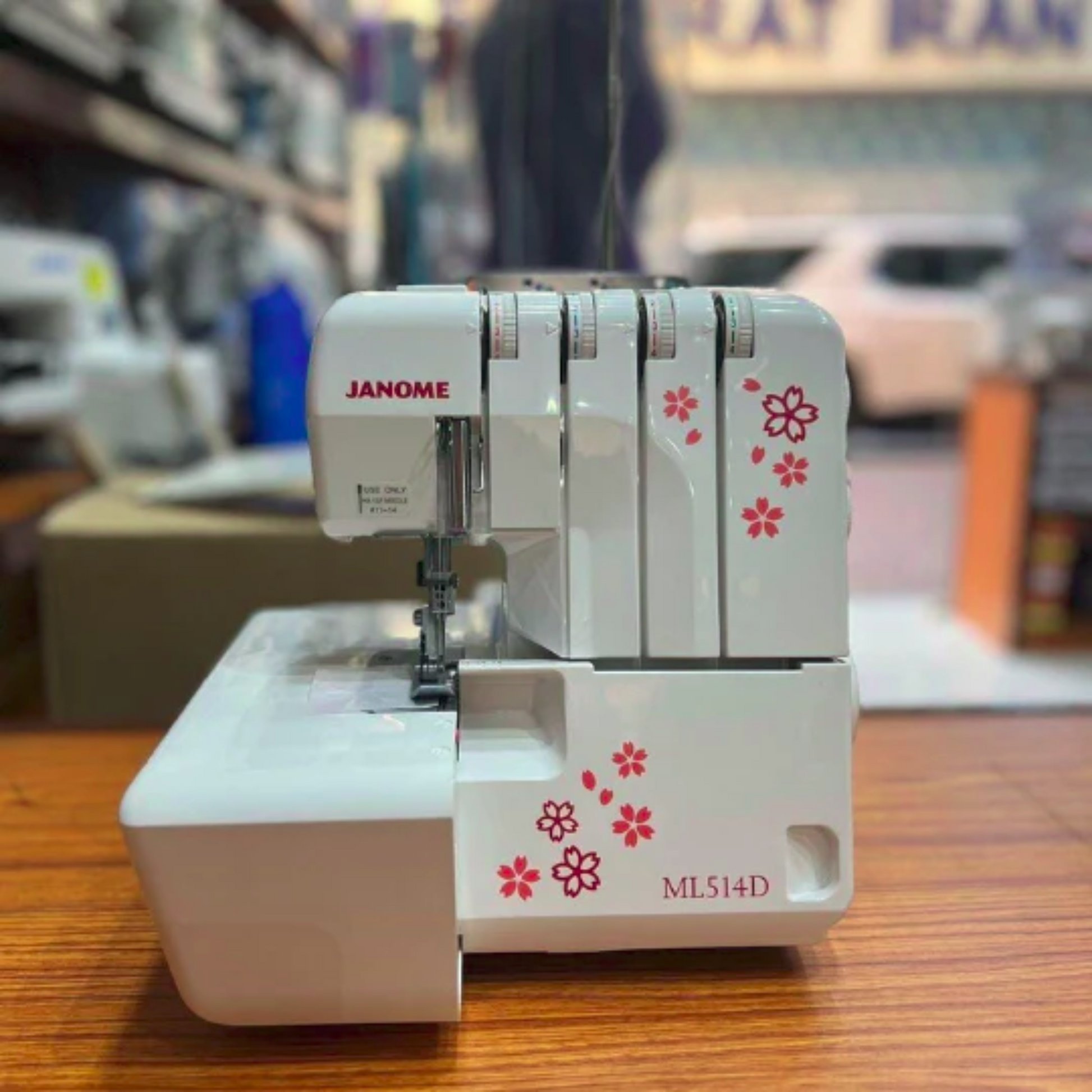 Janome ML514D  - Overlock machine - White - Front view 