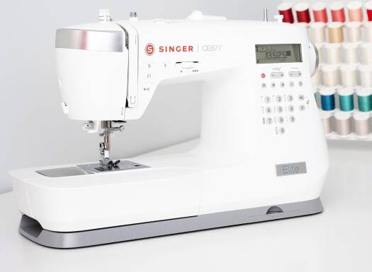 SINGER CE677 Electric Sewing Machine Heavy-Duty Metal Frame, White, Portable & User-Friendly, LCD Screen Displays Stitch Number, Settings, Presser Foot, 6.3" sewing space | CE677 - NEW AL AFRAH