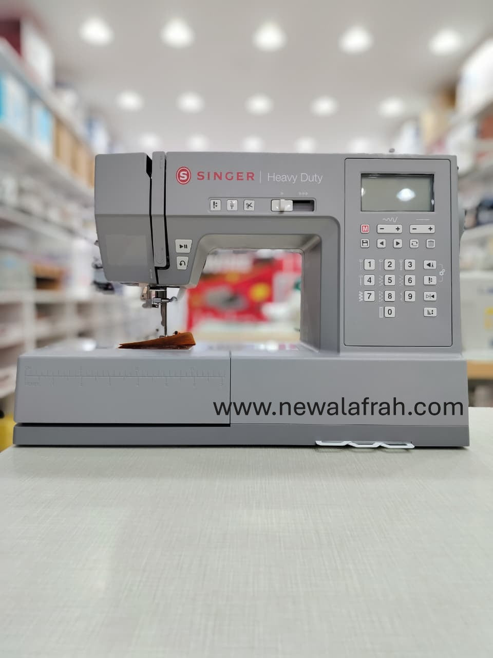 Singer SGM-HD6805C Heavy Duty Digital Sewing Machine, 300 Stitches, 568 Applications, Adjustable Stitch Length And Width, LCD Screen, LED Light, Free Arm, Needle Threader, and Lettering | SGM-HD6805C - NEW AL AFRAH
