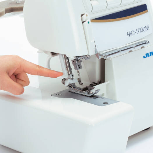 JUKI MO-1000, 2/3/4 Air Threading Overlock With Differential Feed And Rolled Hem, 1,500spm, Automatic Needle Threader, Wide Throat Area, Quiet Operation, LED Sewing Light And Waste Collector | MO-1000 - NEW AL AFRAH