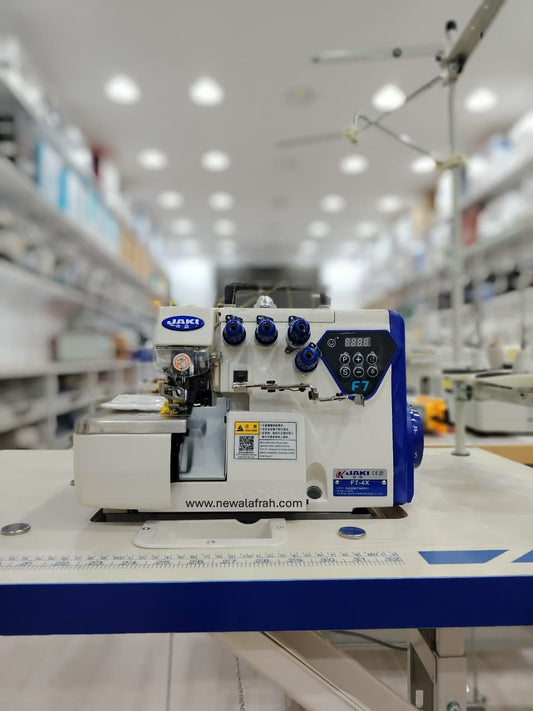 JAKI F7-4x  2 NEEDLE 4 THREAD OVERLOCK COMPLETE SET WITH DIRECT DRIVE MOTOR AND TABLE STAND - NEW AL AFRAH