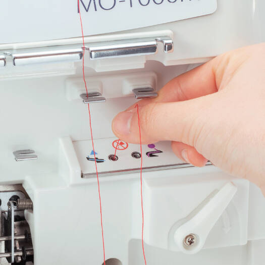 JUKI MO-1000, 2/3/4 Air Threading Overlock With Differential Feed And Rolled Hem, 1,500spm, Automatic Needle Threader, Wide Throat Area, Quiet Operation, LED Sewing Light And Waste Collector | MO-1000 - NEW AL AFRAH