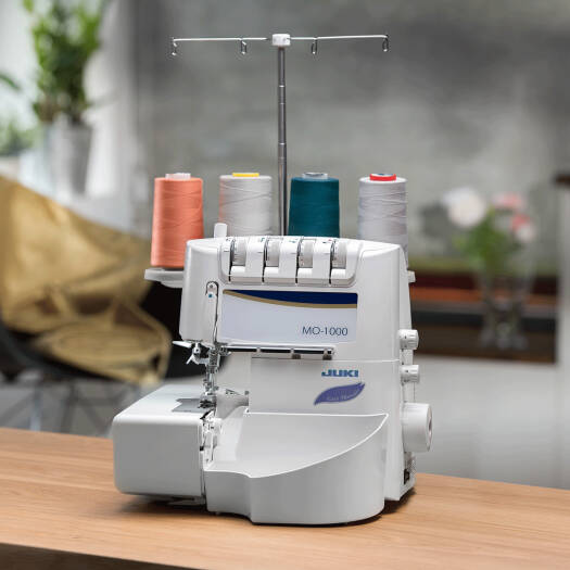 JUKI MO-1000, 2/3/4 Air Threading Overlock With Differential Feed And Rolled Hem, 1,500spm, Automatic Needle Threader, Wide Throat Area, Quiet Operation, LED Sewing Light And Waste Collector | MO-1000 - NEW AL AFRAH